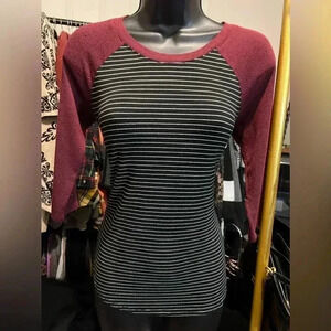 Black and white striped baseball style top with maroon sleeves, xs, fits large